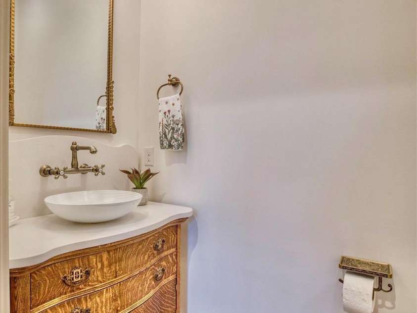 1165 Red Cedar Way, Lenoir, NC 28645.  MLS# CAR4218070, YatesRealty ID 11925. Powder room with antique tiger oak vanity and pedastal sink.  Bespoke light fixture