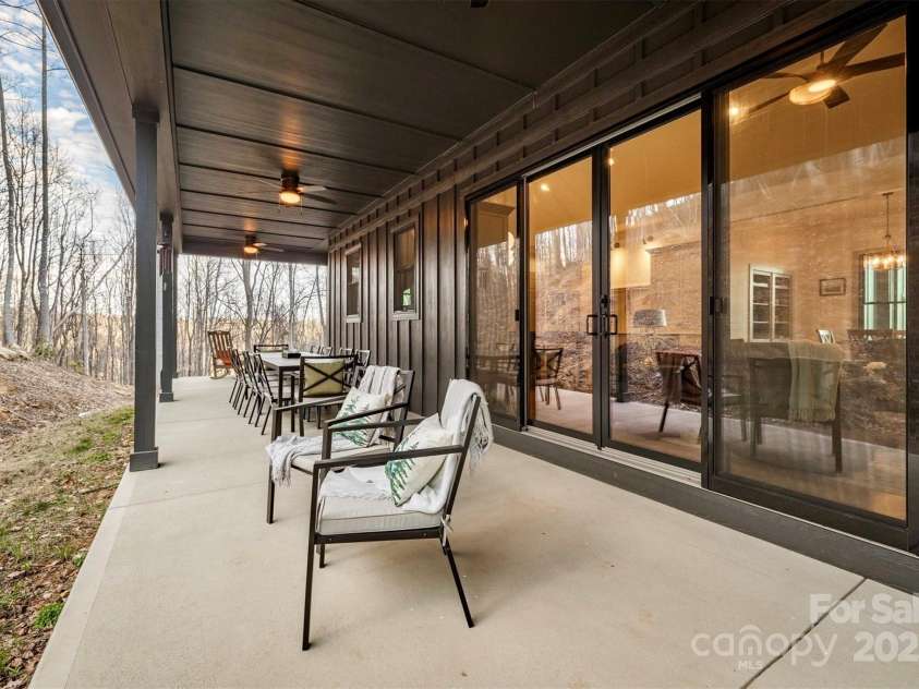 1165 Red Cedar Way, Lenoir, NC 28645.  MLS# CAR4218070, YatesRealty ID 11925. Which beverage do you prefer to sip from your porch rocking chair?