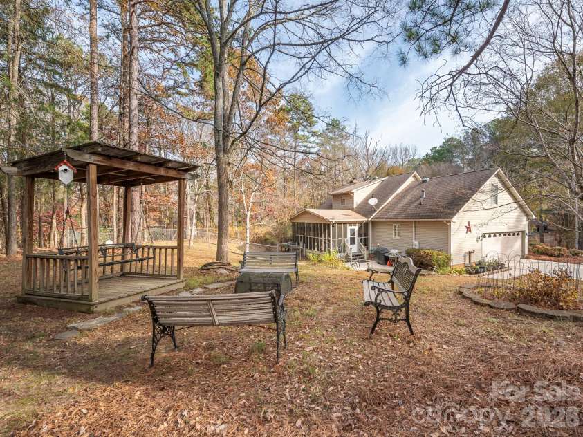 1800 Lake Lynn Road, Concord, NC 28025.  MLS# CAR4316180, YatesRealty ID 11927. PERGOLA OVERLOOKING A HUGE BACK YARD