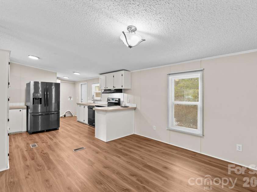 211 Forest Hollow Drive, Statesville, NC 28677.  MLS# CAR4342201, YatesRealty ID 11930. 