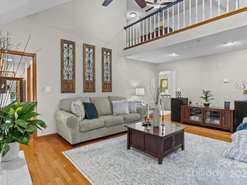 7146 Sifford Road, Stanley, NC 28164.  MLS# CAR4238571, YatesRealty ID 11937. 2 story great room w/ skylight and gas fireplace