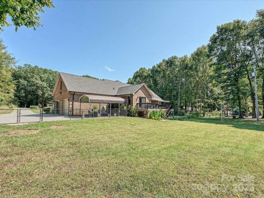 7146 Sifford Road, Stanley, NC 28164.  MLS# CAR4238571, YatesRealty ID 11937. Exterior back