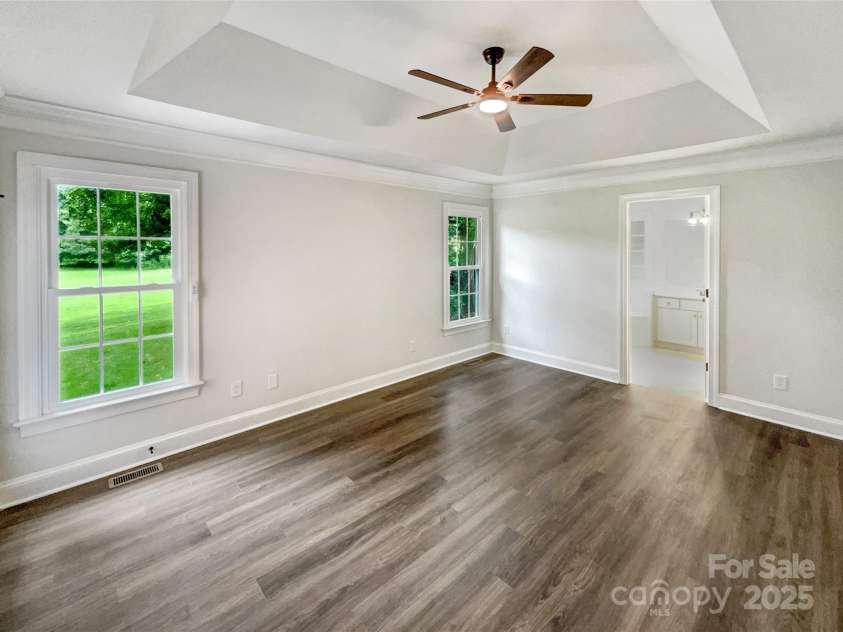 8117 Shannon Woods Lane, Matthews, NC 28104.  MLS# CAR4285282, YatesRealty ID 11940. 