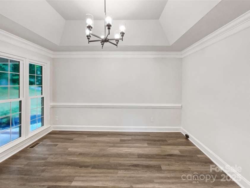 8117 Shannon Woods Lane, Matthews, NC 28104.  MLS# CAR4285282, YatesRealty ID 11940. 
