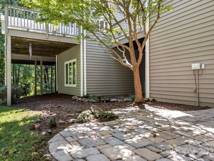 85 Tall Poplar Summit, Hendersonville, NC 28739.  MLS# CAR4185723, YatesRealty ID 11940. Lower level patio