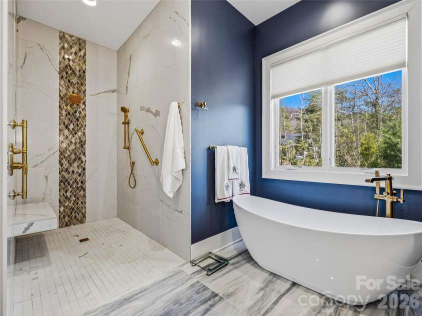 145 Chattooga Run, Hendersonville, NC 28739.  MLS# CAR4360363, YatesRealty ID 11941. Deep zero entry shower