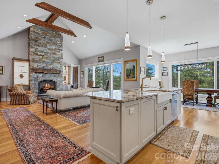 145 Chattooga Run, Hendersonville, NC 28739.  MLS# CAR4360363, YatesRealty ID 11941. Vaulted ceilings provide dramatic space