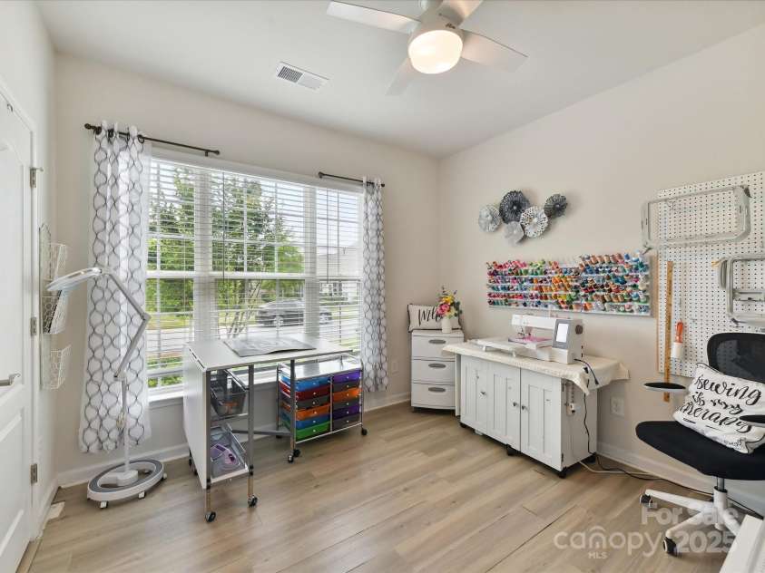 3333 Oliver Stanley Trail, Lancaster, SC 29720.  MLS# CAR4251729, YatesRealty ID 11943. Bedroom 3 with Fan currently used as a Sewing Room