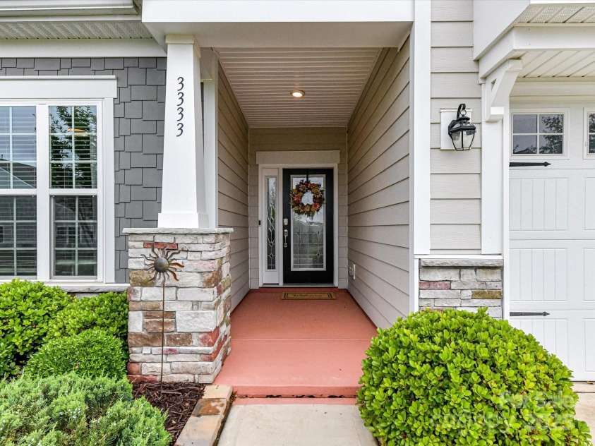 3333 Oliver Stanley Trail, Lancaster, SC 29720.  MLS# CAR4251729, YatesRealty ID 11943. Covered Front Entry. Fiber Cement and Stone Accents