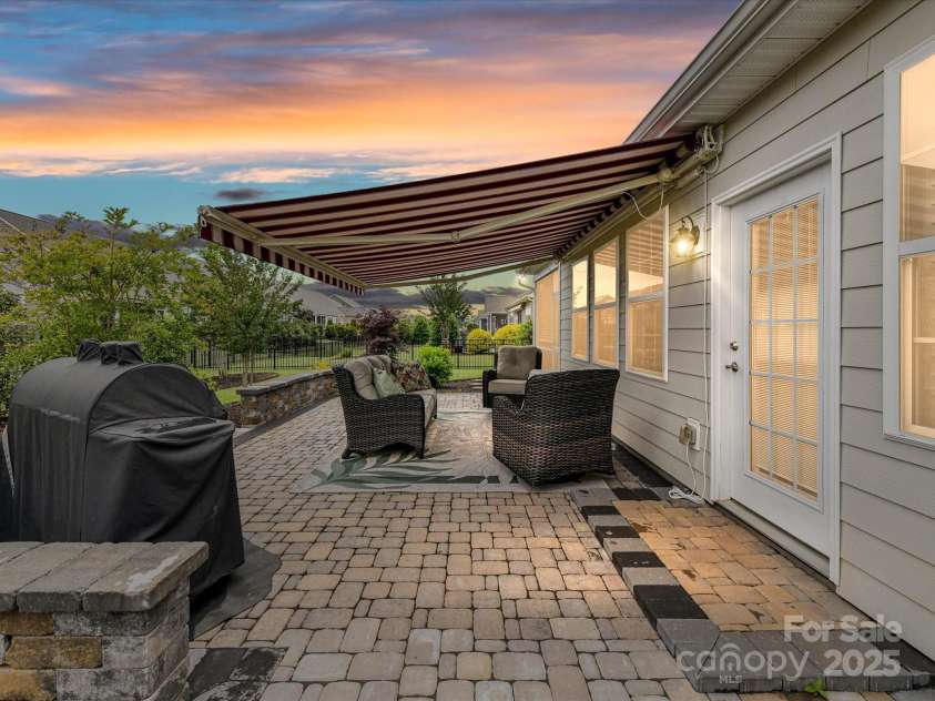 3333 Oliver Stanley Trail, Lancaster, SC 29720.  MLS# CAR4251729, YatesRealty ID 11943. Twilight View of Extended Paver Patio