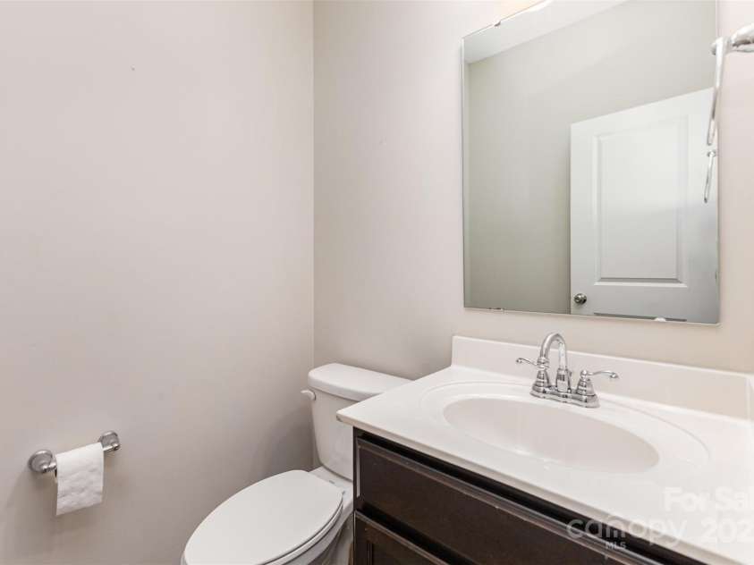 1120 Freeman View Drive, Albemarle, NC 28001.  MLS# CAR4232991, YatesRealty ID 11945. Downstairs half bathroom