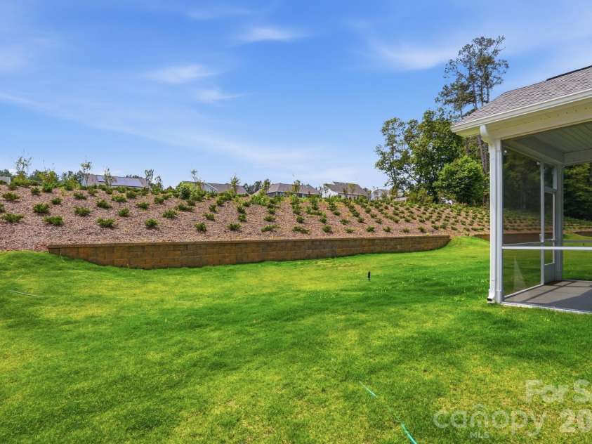5062 McLaughlin Loop, Waxhaw, NC 28173.  MLS# CAR4349436, YatesRealty ID 11945. Backyard