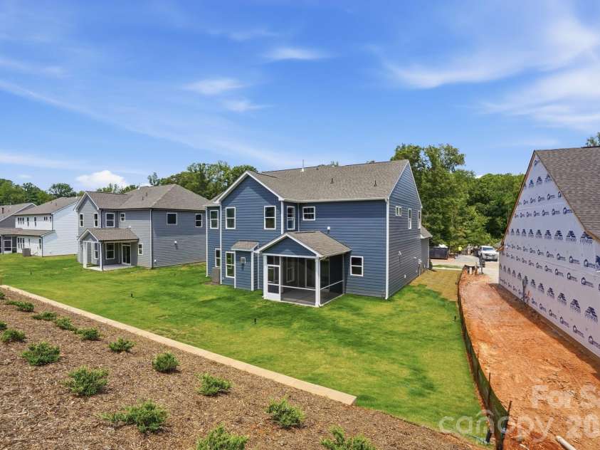 5062 McLaughlin Loop, Waxhaw, NC 28173.  MLS# CAR4349436, YatesRealty ID 11945. Rear of home