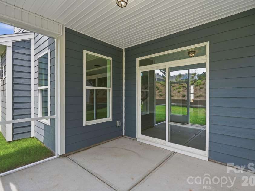 5062 McLaughlin Loop, Waxhaw, NC 28173.  MLS# CAR4349436, YatesRealty ID 11945. Screened Porch