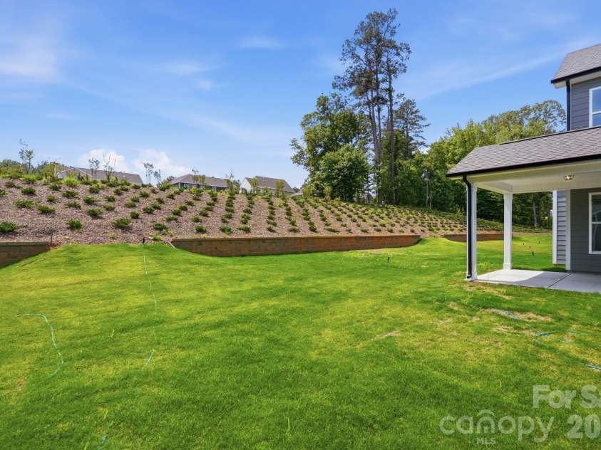 5058 McLaughlin Loop, Waxhaw, NC 28173.  MLS# CAR4351351, YatesRealty ID 11946. Backyard