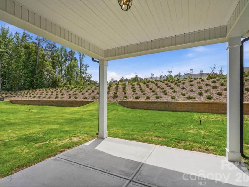5058 McLaughlin Loop, Waxhaw, NC 28173.  MLS# CAR4351351, YatesRealty ID 11946. Covered Porch