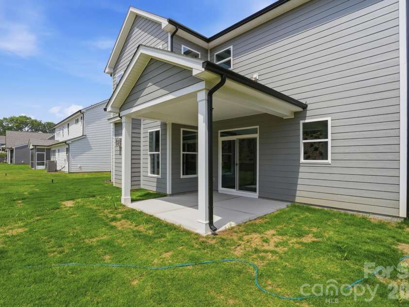 5058 McLaughlin Loop, Waxhaw, NC 28173.  MLS# CAR4351351, YatesRealty ID 11946. Covered Porch