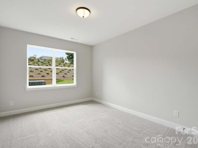 5058 McLaughlin Loop, Waxhaw, NC 28173.  MLS# CAR4351351, YatesRealty ID 11946. Guest Bedroom