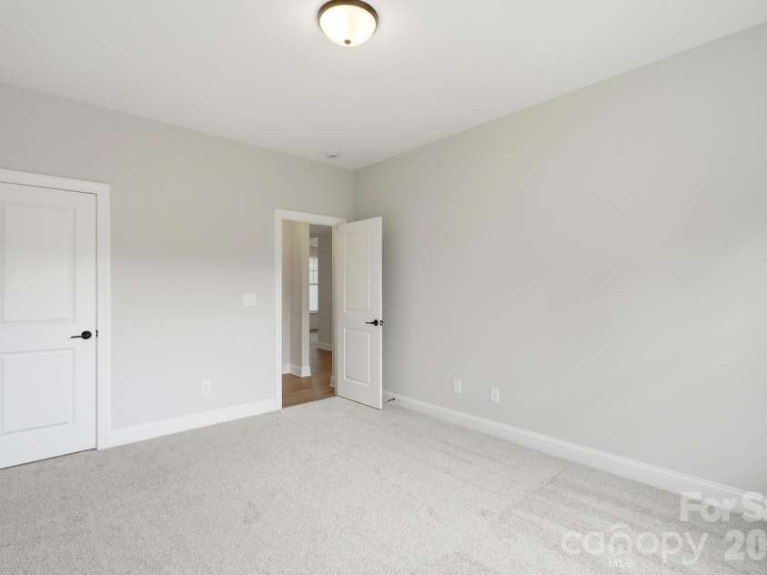 5058 McLaughlin Loop, Waxhaw, NC 28173.  MLS# CAR4351351, YatesRealty ID 11946. Guest Bedroom
