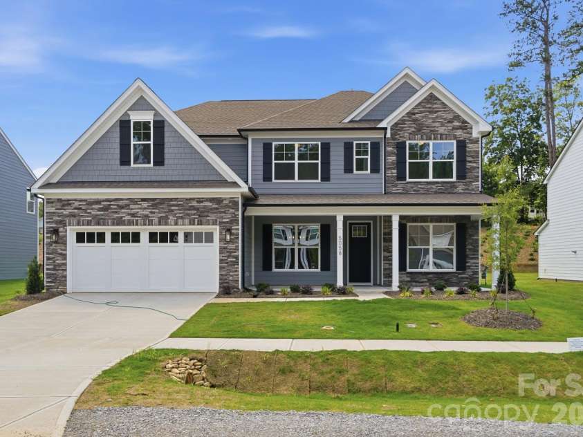 5058 McLaughlin Loop, Waxhaw, NC 28173.  MLS# CAR4351351, YatesRealty ID 11946. Homesite 95 features a Charleston E floorplan