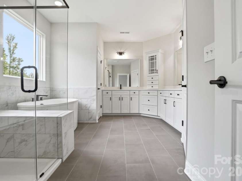5058 McLaughlin Loop, Waxhaw, NC 28173.  MLS# CAR4351351, YatesRealty ID 11946. Primary Bathroom
