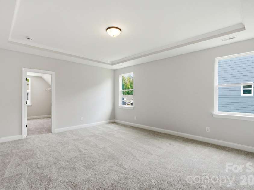 5058 McLaughlin Loop, Waxhaw, NC 28173.  MLS# CAR4351351, YatesRealty ID 11946. Primary Bedroom