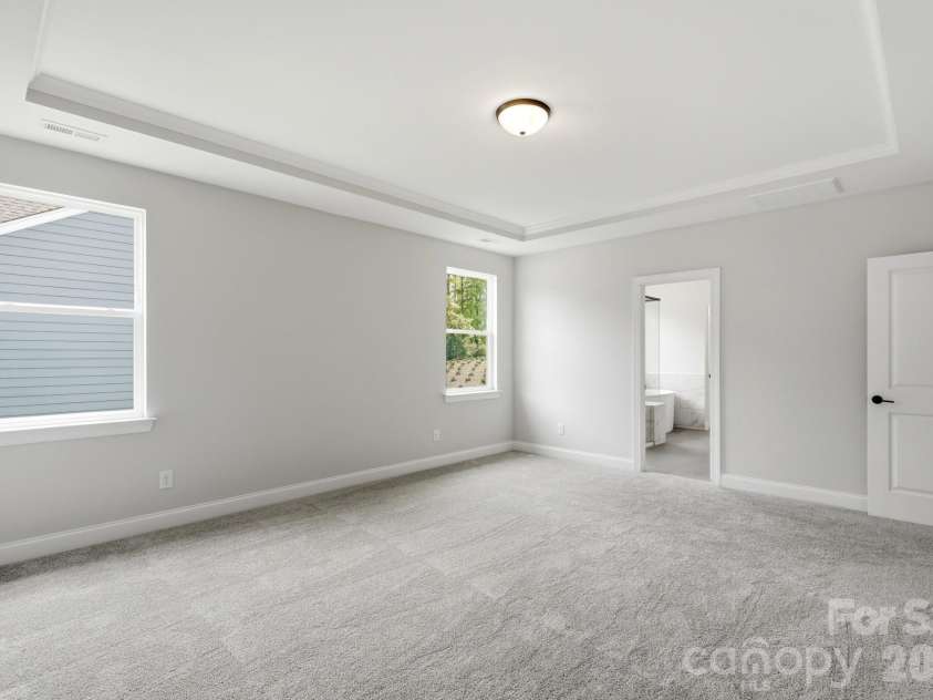 5058 McLaughlin Loop, Waxhaw, NC 28173.  MLS# CAR4351351, YatesRealty ID 11946. Primary Bedroom