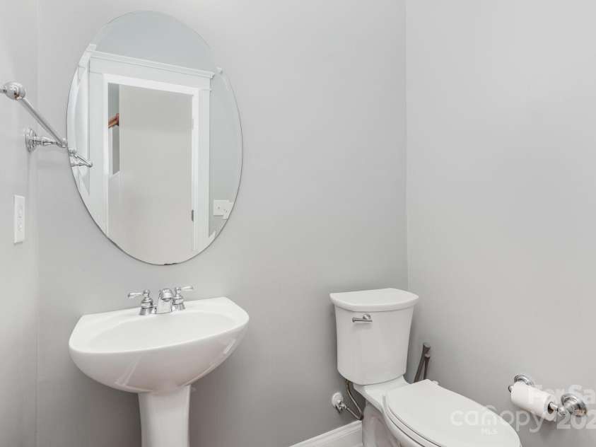 9832 Sunriver Road, Huntersville, NC 28078.  MLS# CAR4241388, YatesRealty ID 11949. Main Floor Powder Room