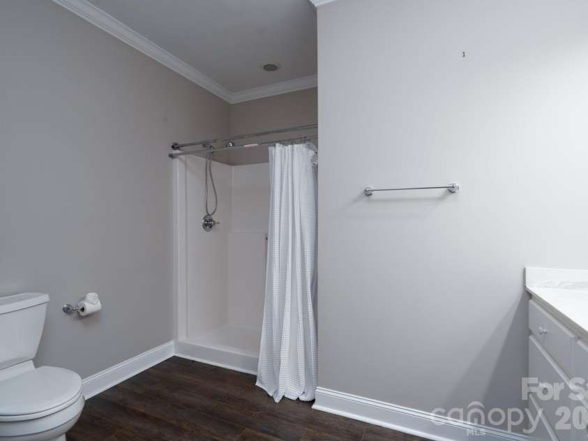 338 Plantation Way, Mount Gilead, NC 27306.  MLS# CAR4335615, YatesRealty ID 1195. Basement Hall Bathroom
