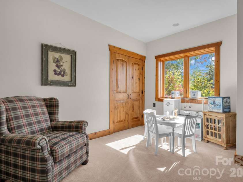 4092 Dense Acre Trail, Nebo, NC 28761.  MLS# CAR4316598, YatesRealty ID 11950. Basement Den