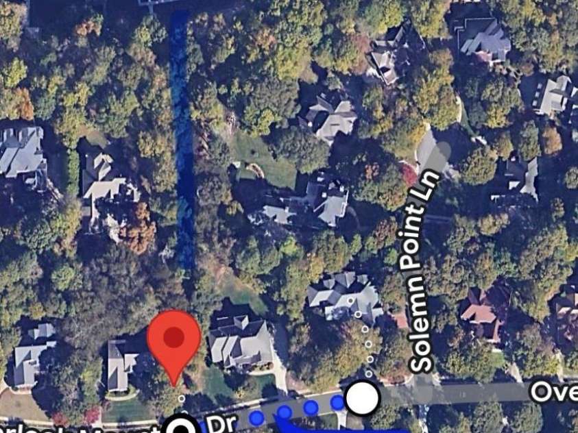 12702 Overlook Mountain Drive, Charlotte, NC 28216.  MLS# CAR4223903, YatesRealty ID 11951. Deeded boat slip is a short walk behind the house.