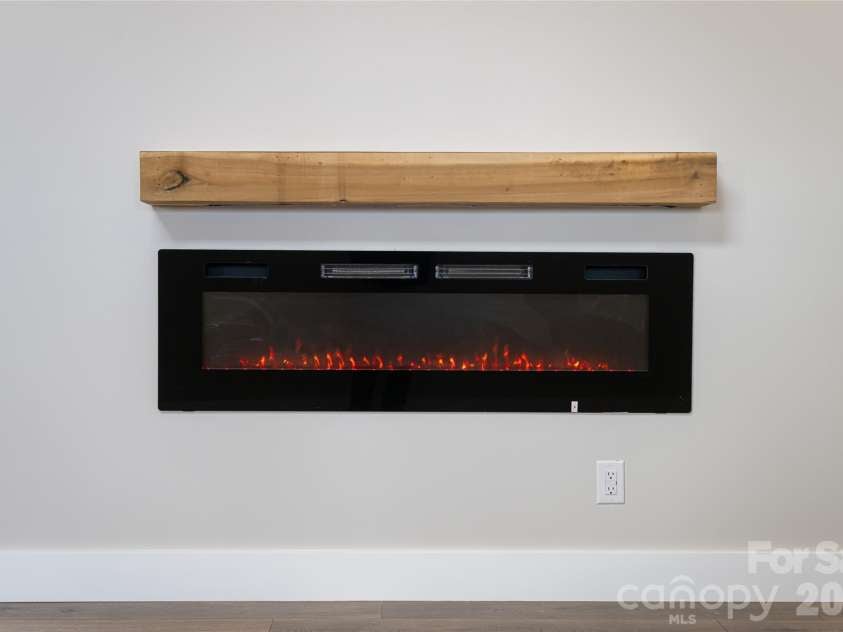 153 Hackleburg Lane, Hendersonville, NC 28792.  MLS# CAR4328212, YatesRealty ID 11954. Left Wing-Electric Fireplace