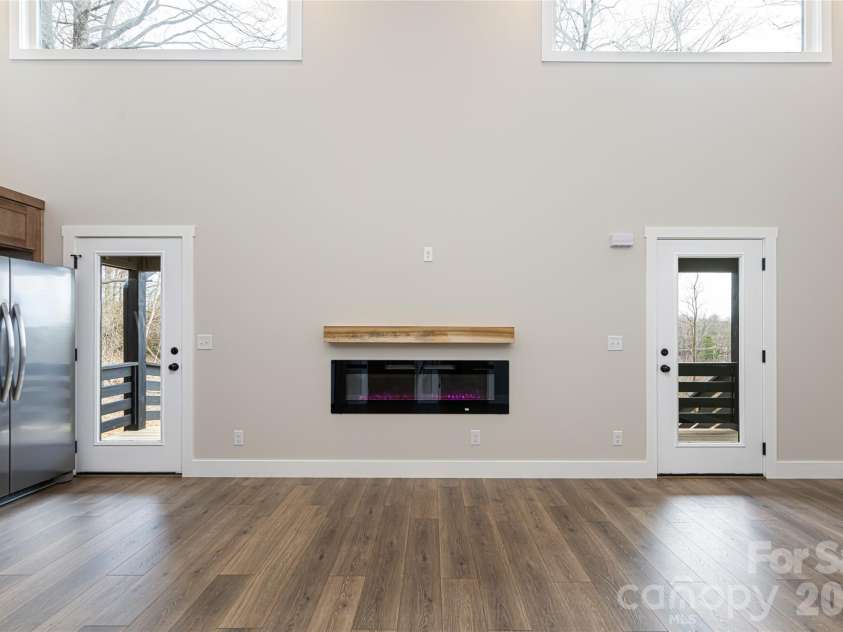 153 Hackleburg Lane, Hendersonville, NC 28792.  MLS# CAR4328212, YatesRealty ID 11954. Light-filled living areas