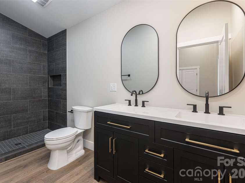 153 Hackleburg Lane, Hendersonville, NC 28792.  MLS# CAR4328212, YatesRealty ID 11954. Right Wing-2nd full Bath (dual vanities)
