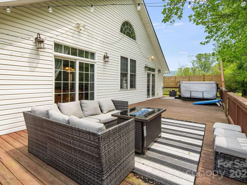 101 McFalls Road, Asheville, NC 28805.  MLS# CAR4254277, YatesRealty ID 11959. Expansive decking for Indoor/outdoor living