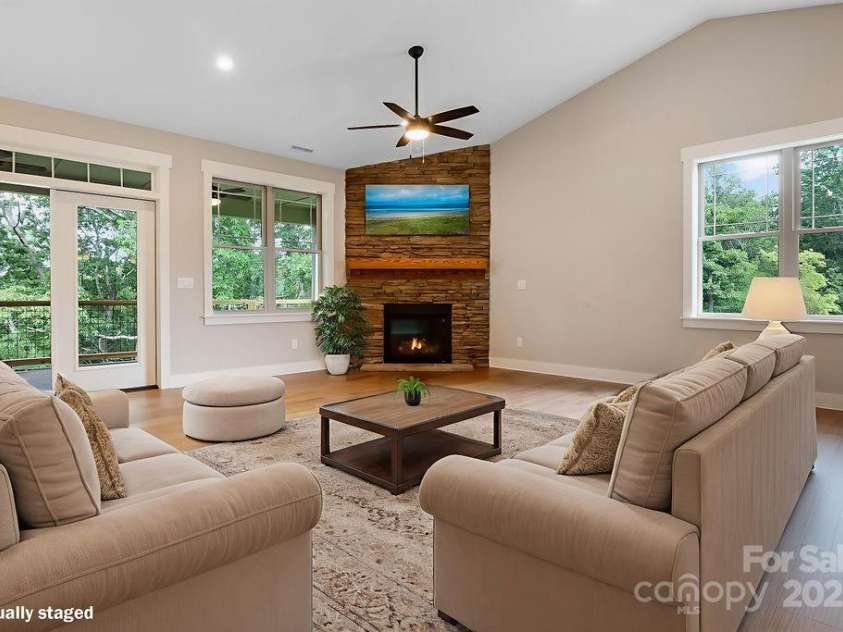 21 Craftsman Overlook Ridge, Arden, NC 28704.  MLS# CAR4007643, YatesRealty ID 11959. Light filled great room.