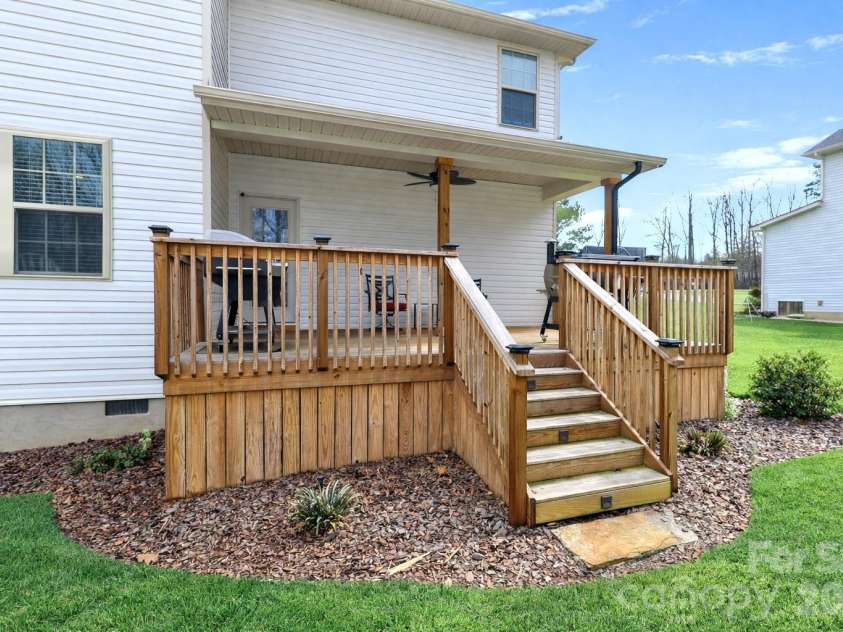137 Northlake Drive, Statesville, NC 28677.  MLS# CAR4336645, YatesRealty ID 11962. Covered back deck