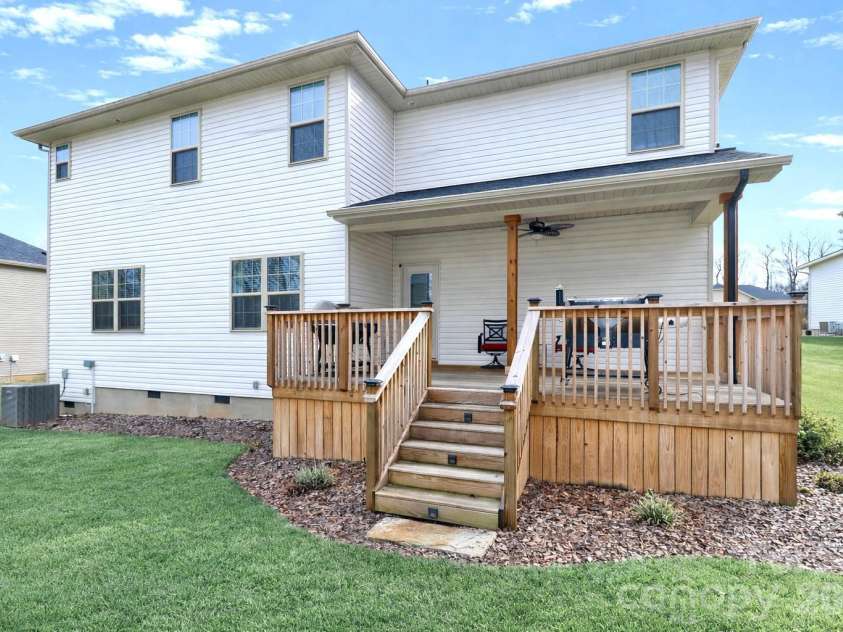 137 Northlake Drive, Statesville, NC 28677.  MLS# CAR4336645, YatesRealty ID 11962. Covered back deck