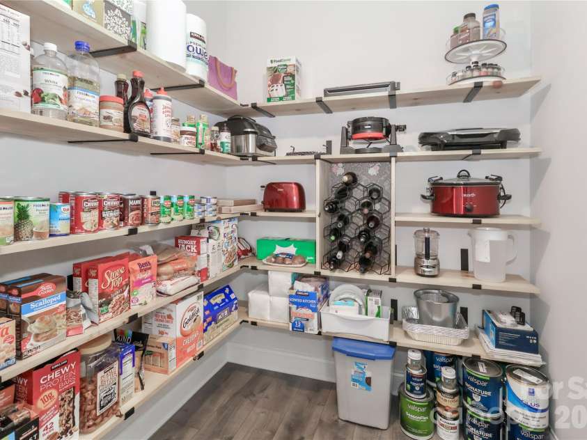 137 Northlake Drive, Statesville, NC 28677.  MLS# CAR4336645, YatesRealty ID 11962. Walk in pantry with solid shelving