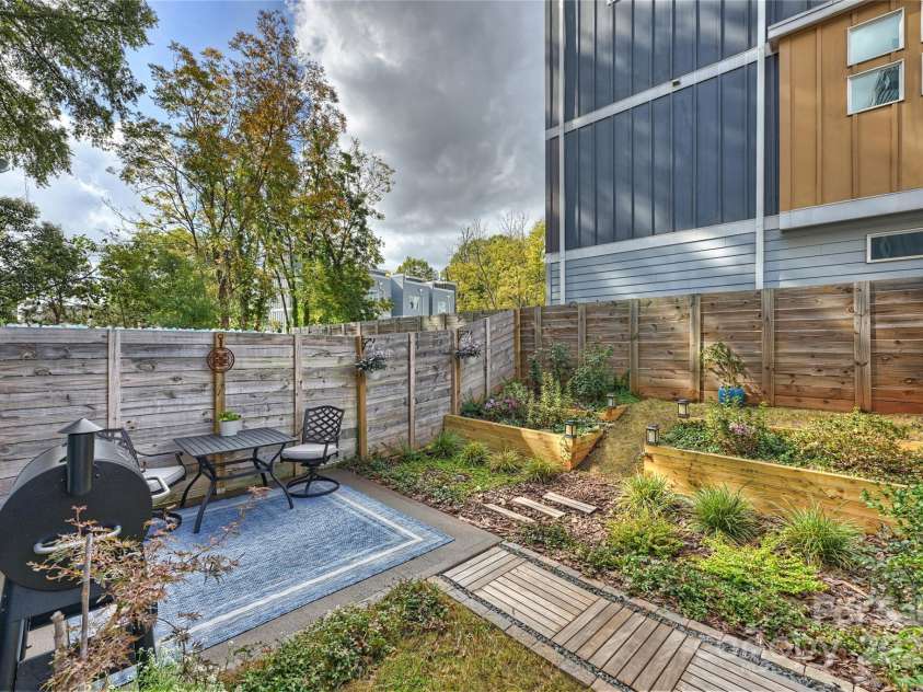 1651 Duckworth Avenue, Charlotte, NC 28208.  MLS# CAR4240581, YatesRealty ID 11963. Back Patio & Yard