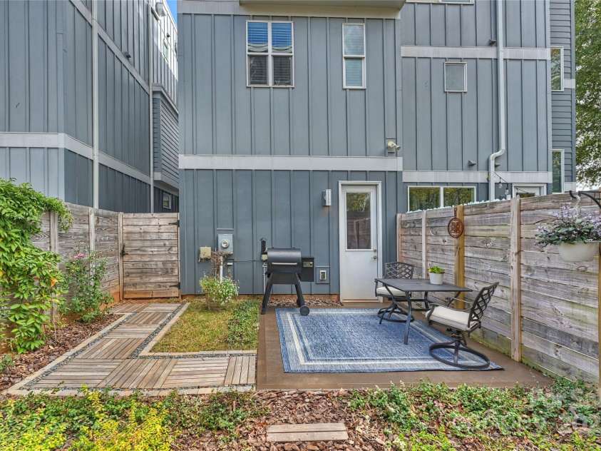 1651 Duckworth Avenue, Charlotte, NC 28208.  MLS# CAR4240581, YatesRealty ID 11963. Back Patio & Yard