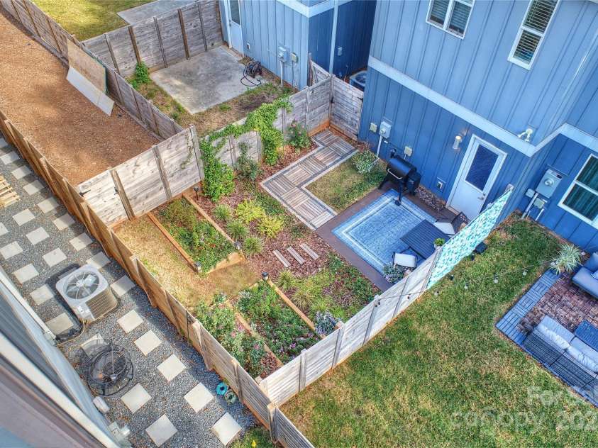 1651 Duckworth Avenue, Charlotte, NC 28208.  MLS# CAR4240581, YatesRealty ID 11963. Back Patio & Yard
