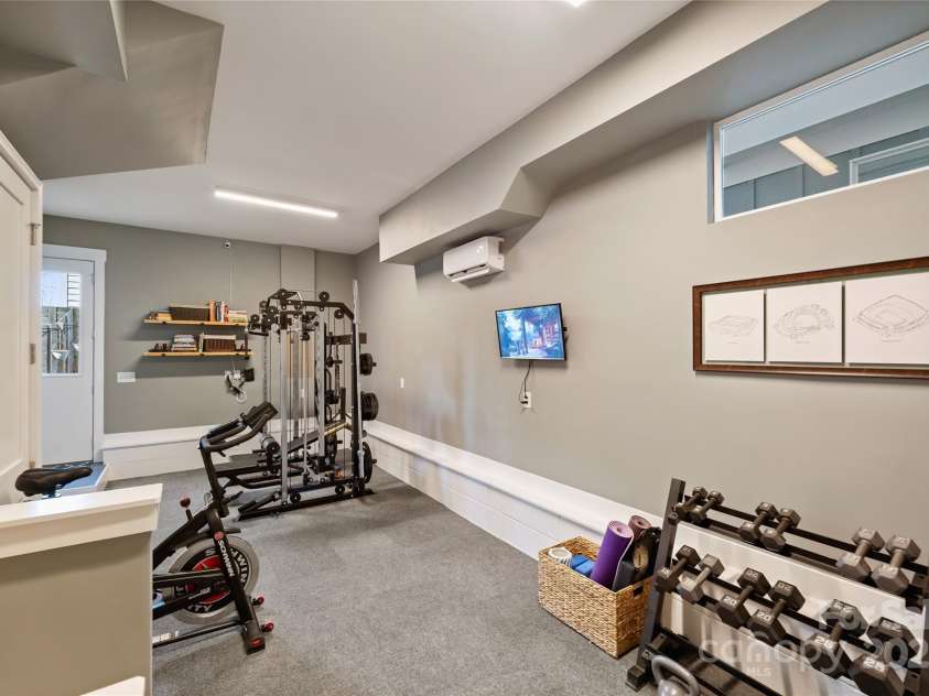 1651 Duckworth Avenue, Charlotte, NC 28208.  MLS# CAR4240581, YatesRealty ID 11963. Flex Space / Bonus Room being used as a Gym