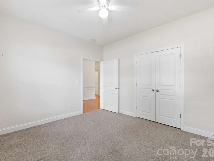 5007 Symphony Lane, Indian Trail, NC 28079.  MLS# CAR4364786, YatesRealty ID 11963. Double doors for closet in secondary bedroom