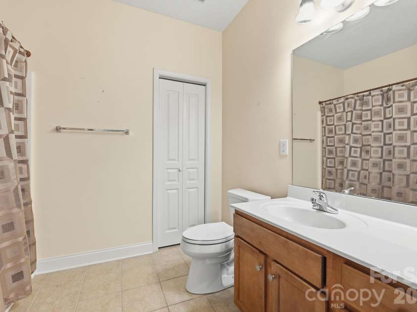 5007 Symphony Lane, Indian Trail, NC 28079.  MLS# CAR4364786, YatesRealty ID 11963. Full second bath with separate linen closet