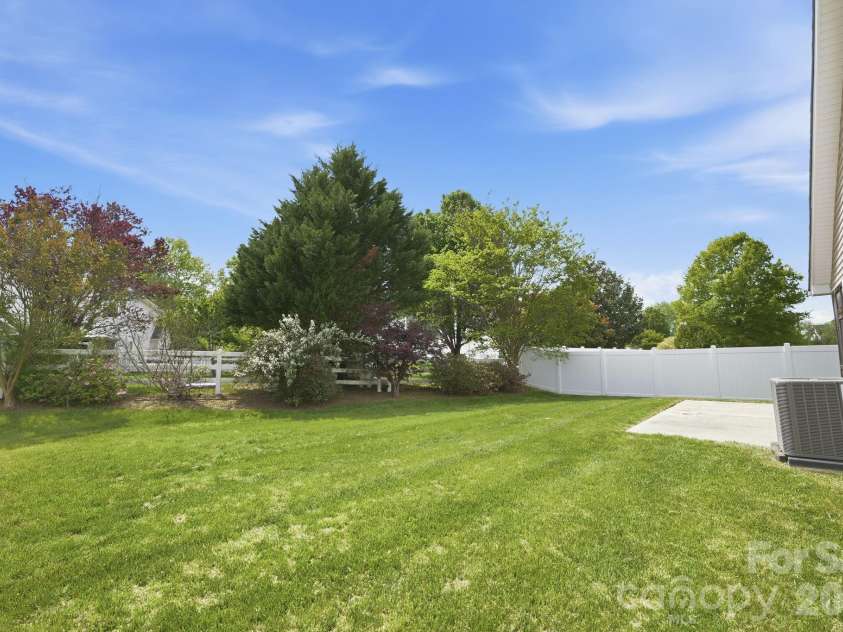 5007 Symphony Lane, Indian Trail, NC 28079.  MLS# CAR4364786, YatesRealty ID 11963. Spacious yard