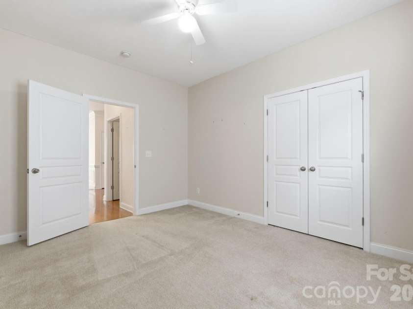 5007 Symphony Lane, Indian Trail, NC 28079.  MLS# CAR4364786, YatesRealty ID 11963. Third bedroom with double doors for closet