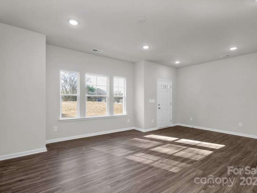 483 Shasta Street, Gastonia, NC 28052.  MLS# CAR4257207, YatesRealty ID 11976. Sierra Ridge Townhomes Austin Living/Dining Area