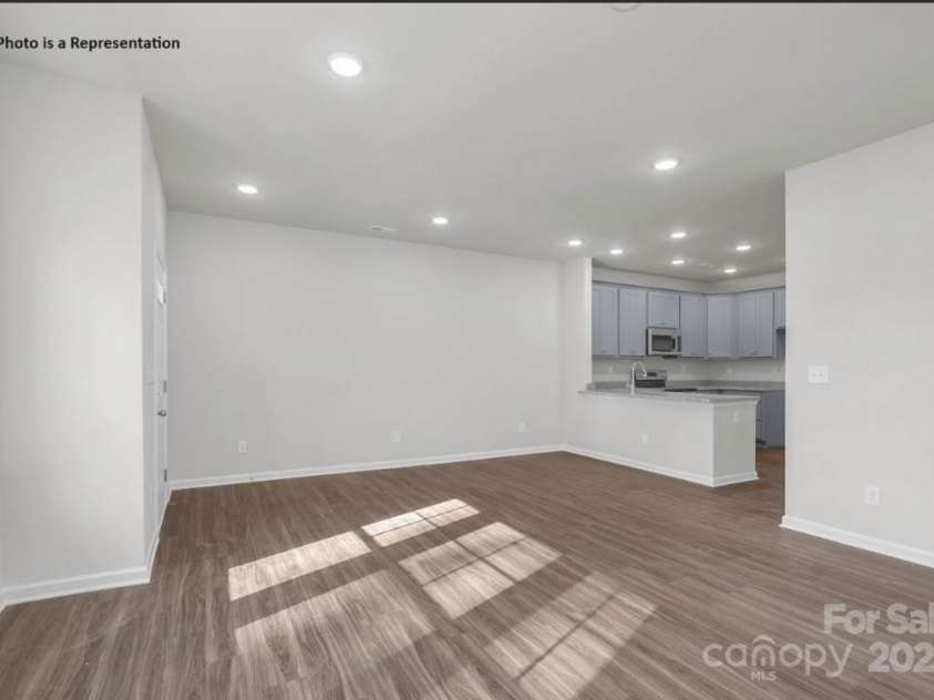 483 Shasta Street, Gastonia, NC 28052.  MLS# CAR4257207, YatesRealty ID 11976. Sierra Ridge Townhomes Austin Living/Dining Area