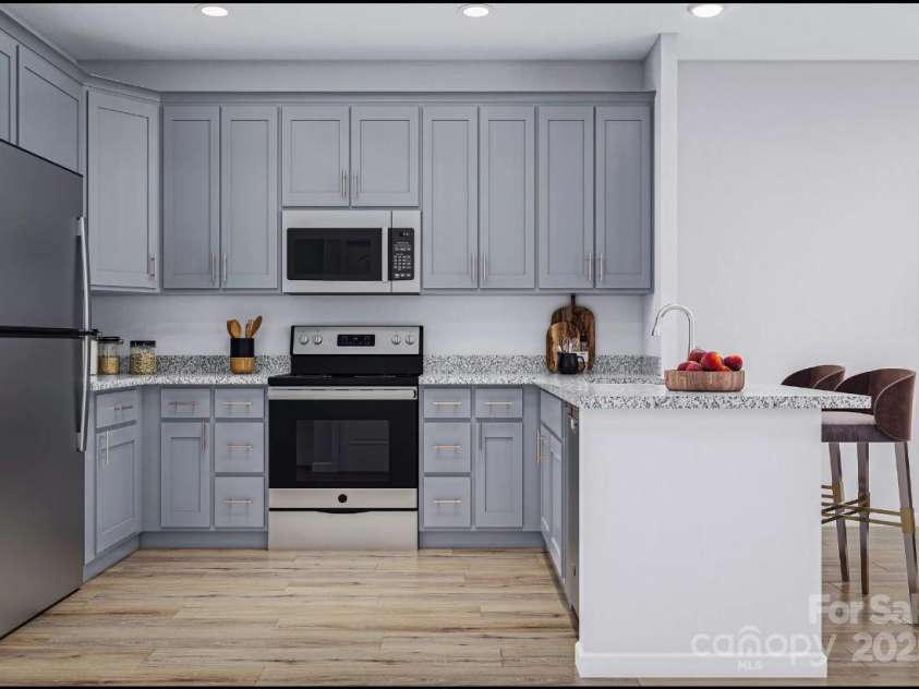 483 Shasta Street, Gastonia, NC 28052.  MLS# CAR4257207, YatesRealty ID 11976. Sierra Ridge Townhomes Gourmet Kitchen